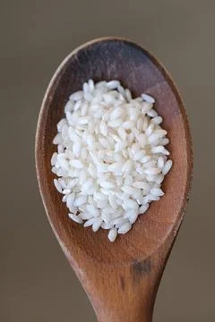 Rice on a spoon Stock Photos
