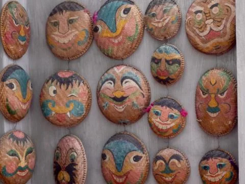 Rice straw baskets decorated with faces Stock Photos