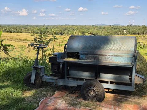 Rice threshing machine or commonly called tleser Stock Photos