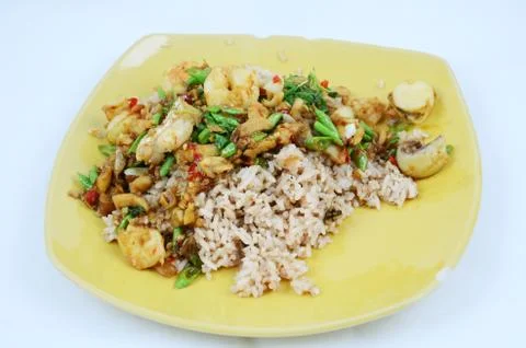 Rice topped with basil Stock Photos