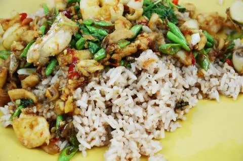 Rice topped with basil Stock Photos