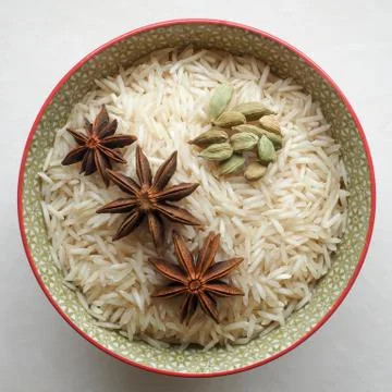 Rice Uncooked with Spices Stock Photos
