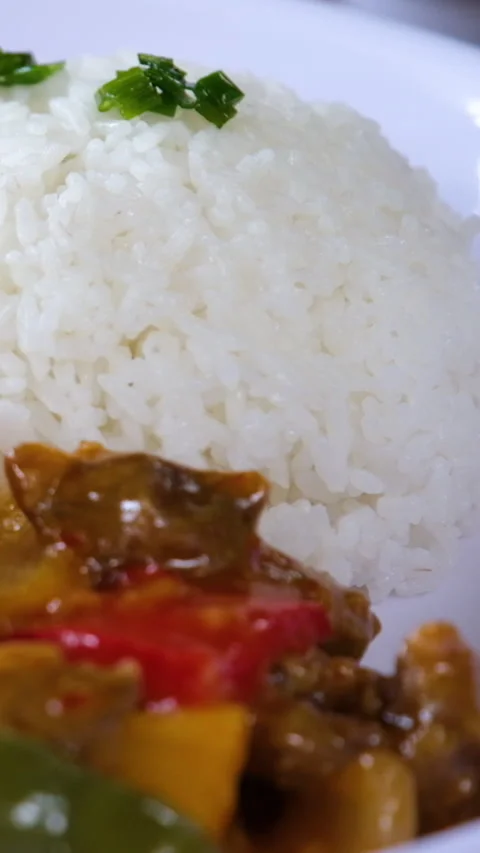 Rice with vegetables The whole cooking process of Japanese curry pork chop rice Stock Footage 277167209