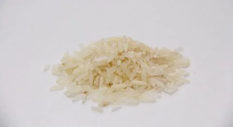 Rice on white background Stock Photos