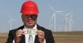 Rich Business Man Show One Hundred Dollars Bill Energy Production Wind Turbines 4k or 4k+ Resolution