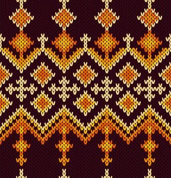 Rich, dark knitted pattern with vibrant orange and yellow geometric and diam Stock Illustration
