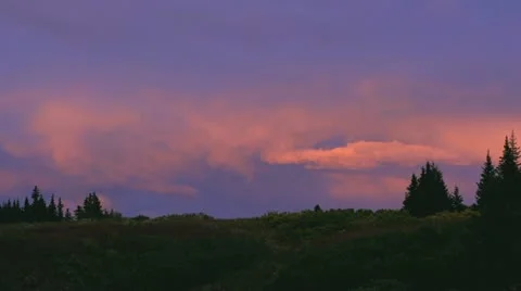 Rich Deep Hue Sunset over Alaskan Hills and Forest Stock Footage 12133597