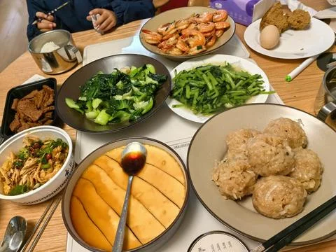 Rich Dinner Table / Feast Spread with Various Dishes Stock Photos