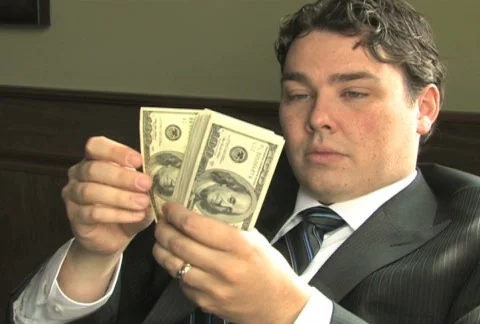 Rich Guy Counts Money 2 Stock Footage 285662