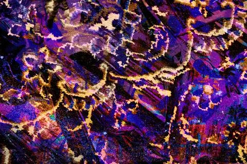 Rich, high-contrast composition of deep purples, oranges, and golds forming Stock Photos
