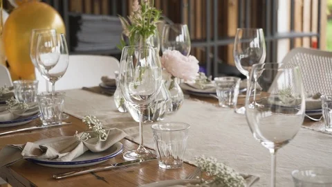 A rich luxury wedding with elements of dish decoration, golden plates, knives, Stock Footage 115789521