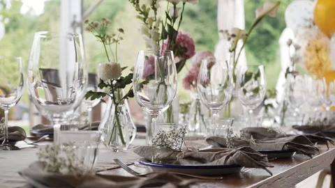 A rich luxury wedding with elements of dish decoration, golden plates, knives, Stock Footage 115789724