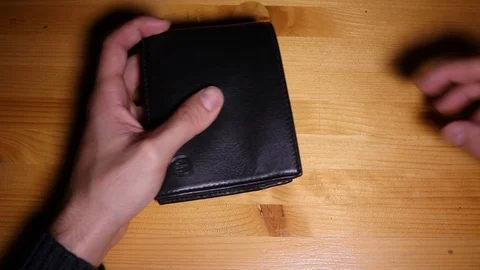 Rich man opens wallet full of money, euro banknotes, concept of economic wealth Stock Footage 120515149