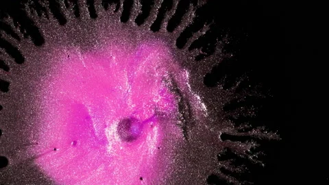 Rich Pink liquid flows onto black background. Macro Abstract liquid paint visual Stock Footage 135572906