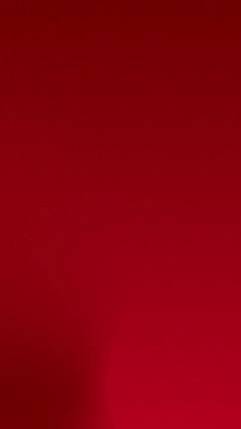 Rich red gradient with soft shadow overlay. Seamless loop background. 4K. Vidéo 309957119