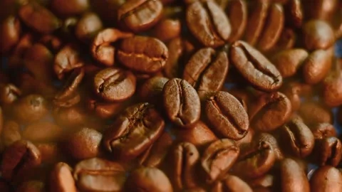 Rich Roasted Coffee Beans with Rising Steam Video Stock-Footage 345041866