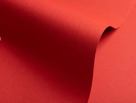 Rich ruby red paper texture with a crosshatch pattern and fine embossed det.. Stock Photos