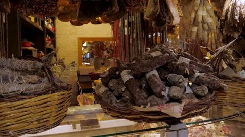 The rich selection of different kinds of dried sausages, ham and meat products Stock Footage 146479163