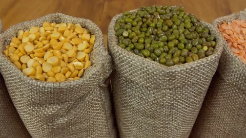 Rich source of protein - Different Dals / lentils kept in jute sacks in the k... Stock Footage 162291402