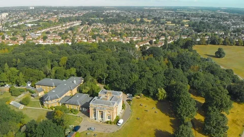 Rich Versus Poor Flying over a Mansion Towards Populated Houses Drone Stock Footage 105254359