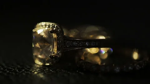 Rich wedding ring sparkles in the rays of morning sun Video stock 68717046