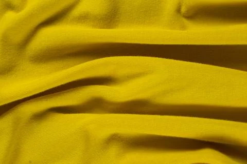 Rich yellow fabric background, pattern and macro texture Foto stock