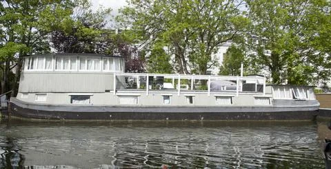 Richard Branson's Houseboat The Duende Which Is Moored Close To Where A Woman's  Stock Photos