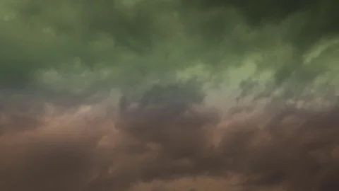 Richly colored clouds during an active storm sunset. Shot in time lapse. Stock Footage 76248538