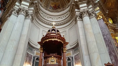 The richly decorated pulpit and columns inside the historic Berliner Dom Stock Footage 343140481