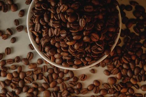 Richly roasted coffee beans create a warm ambiance for morning rituals Stock Photos