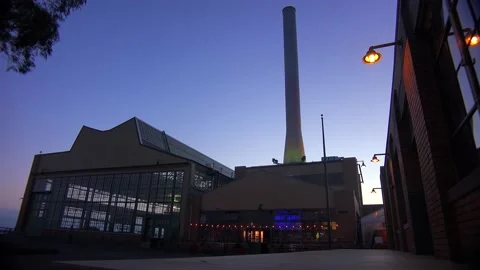 RICHMOND, CA - 2023 - An old dockside warehouse or factory with a large Stock Footage 264611482