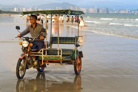 Rickshaw driver of the beach Stock Photos