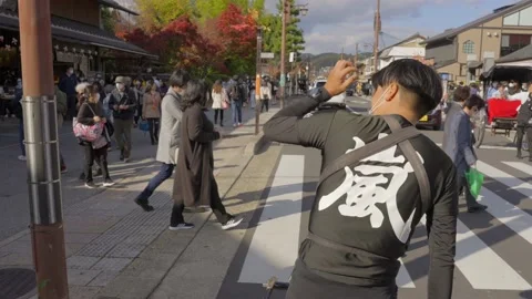Rickshaw driver stops at cross walk Stock Footage 233226563