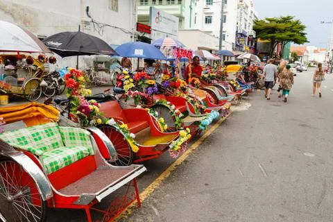 Rickshaw driver waiting for customer on Georgetown Street Stock Photos