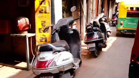 Rickshaw drivie through the Traffic congestion and street life in the City of Stock Footage 196988045