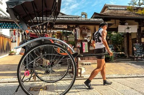 Rickshaw man returns to his post. Stock Photos