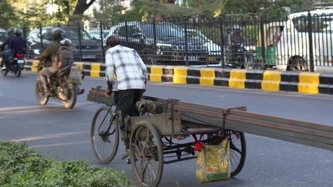 Rickshaw Puller Riding Through Busy Indian Road Traffic Stock Footage 326360716