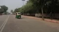 Rickshaws and cars on the street in India HD Footage