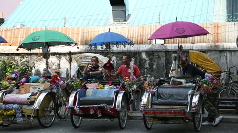 Rickshaws lined the street waiting for customers, George Town, Malaysia Stock Footage 48221157