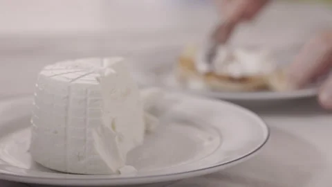 Ricotta cheese and toasted bread Stock Footage 338043095