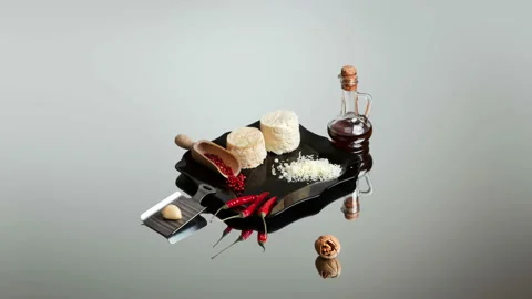 Ricotta cheese, chilli peppers and a bottle of tincture still life Stock Footage 101506118