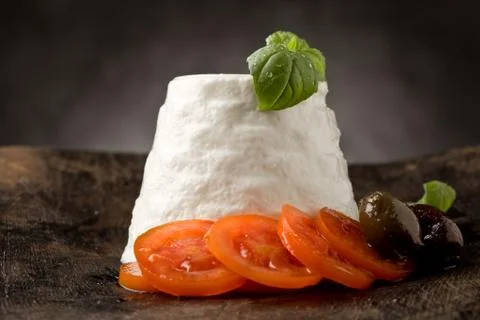 Ricotta cheese with tomatoes Stock Photos