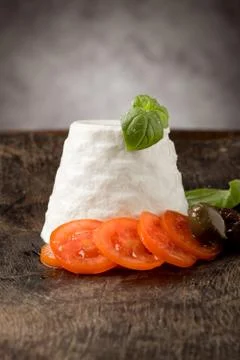 Ricotta cheese with tomatoes Stock Photos