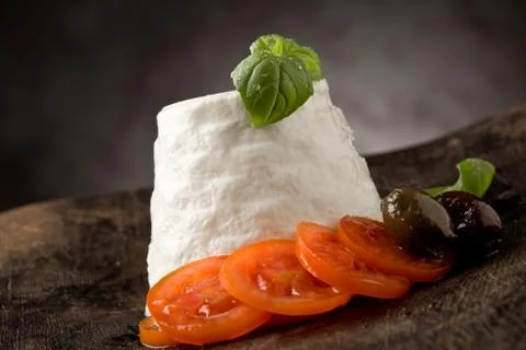 Ricotta cheese with tomatoes Stock Photos