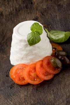 Ricotta cheese with tomatoes Stock Photos