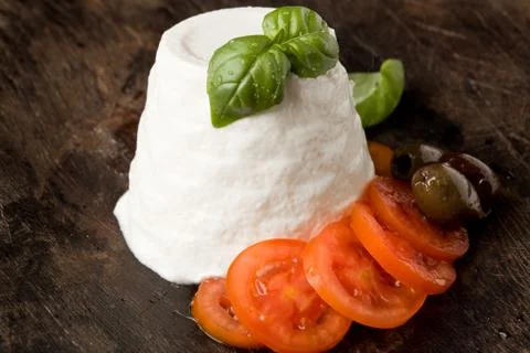 Ricotta cheese with tomatoes Stock Photos