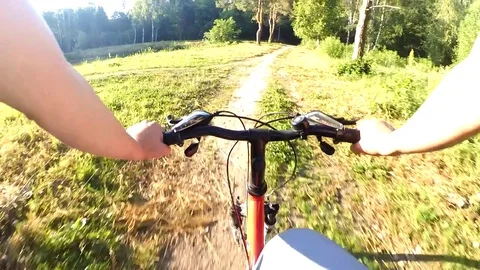 Ride a bicycle in the forest action camera Stock Footage 77259872