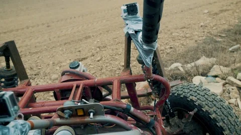 Ride on a Buggy on dirt field down Stock-Footage 122594007
