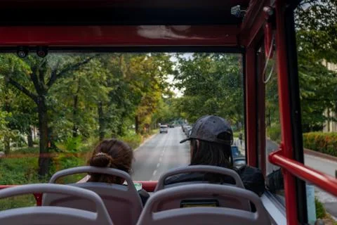 Ride the double Decker bus on the second floor on a rainy day. Stock Photos