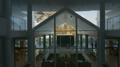 A ride in a modern glass elevator as the camera pans smoothly capturing Video stock 327391551